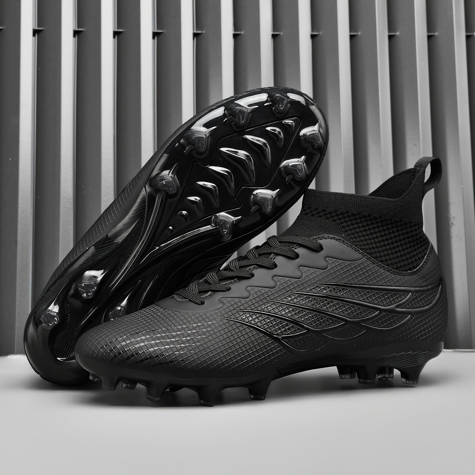 Adult high-top football boots advertised with AG studs